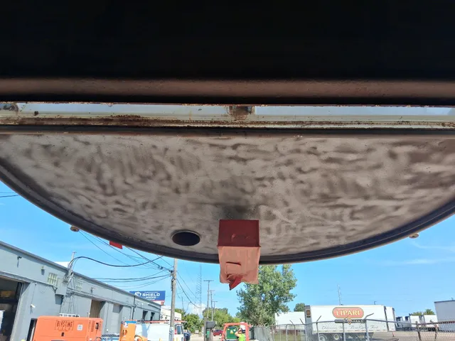 Vacuum truck tank exterior after blasting and relining