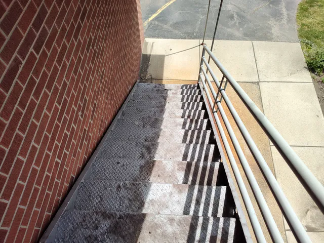 Bird's eye view of staircase with railing