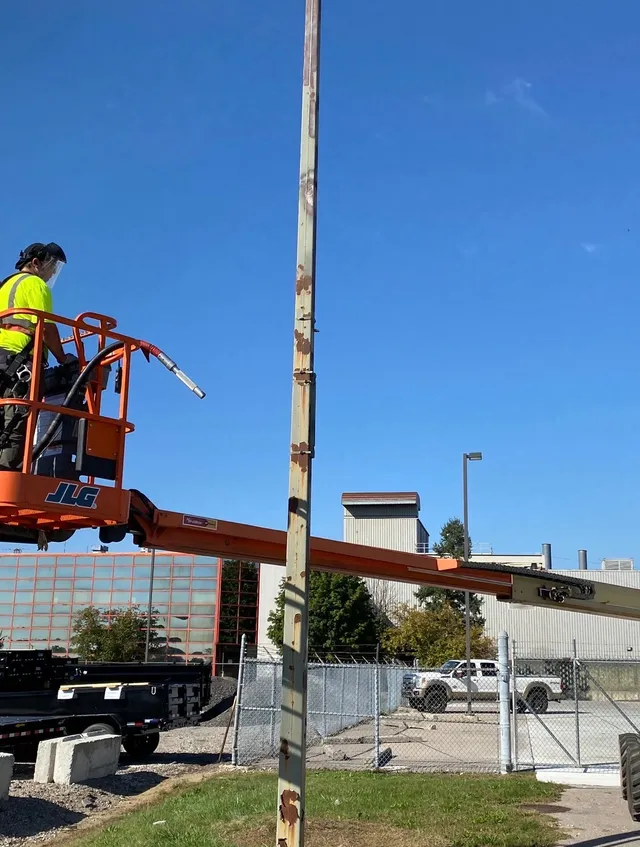 Light pole sandblasting — Milan Ford
