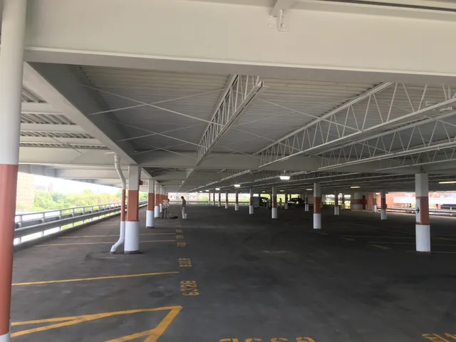 Parking garage blast and repaint — full level after blast and repaint