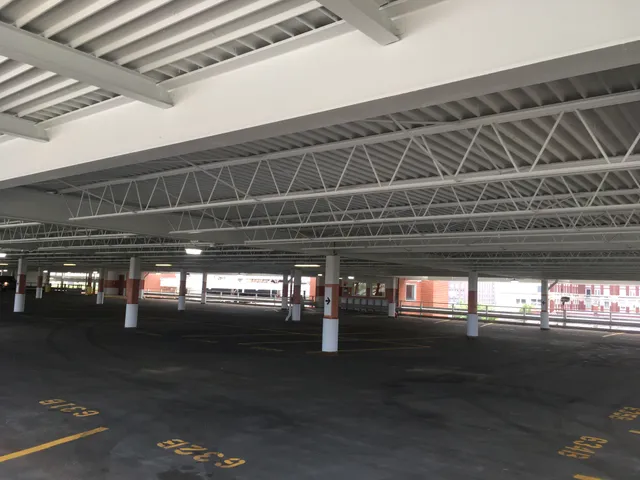 Parking garage blast and repaint — structural steel coating completed