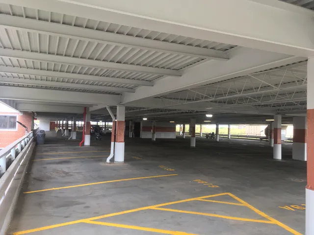 Parking garage blast and repaint — freshly coated columns