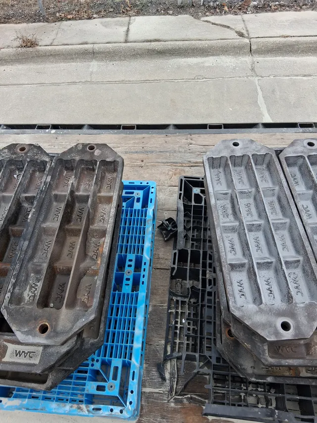 Alloy molds laid out after blasting