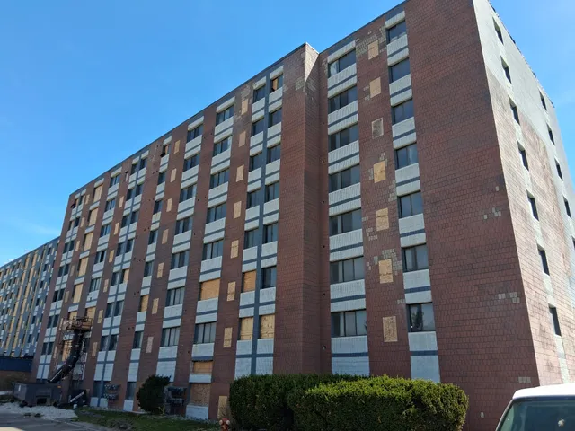 Concord Tower Apartments — blasting the high-rise facade panels