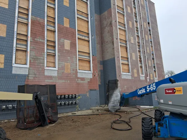 Concord Tower Apartments — facade panel section prepared for blasting