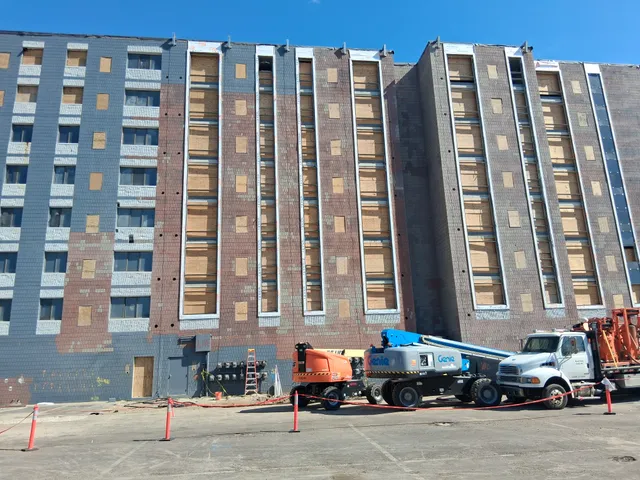 Concord Tower Apartments — blast equipment staged at the building