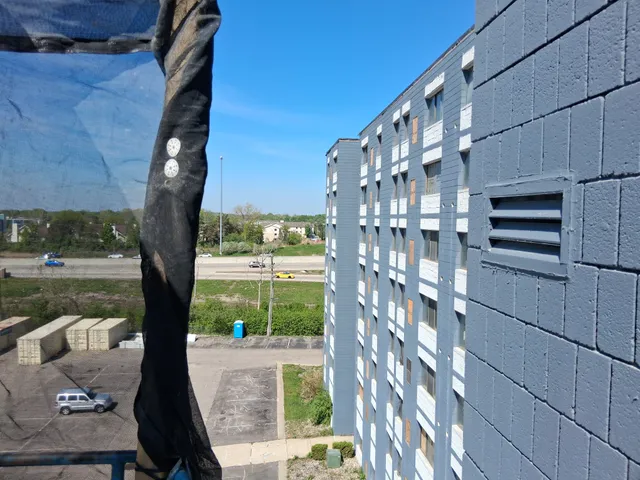 Concord Tower Apartments — facade detail during surface preparation