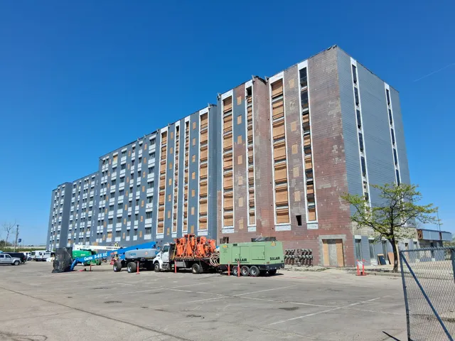 Concord Tower Apartments — blast rig and equipment staged at the tower