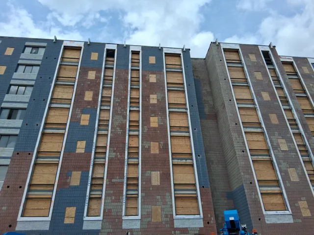 Concord Tower Apartments — upward view of the high-rise facade