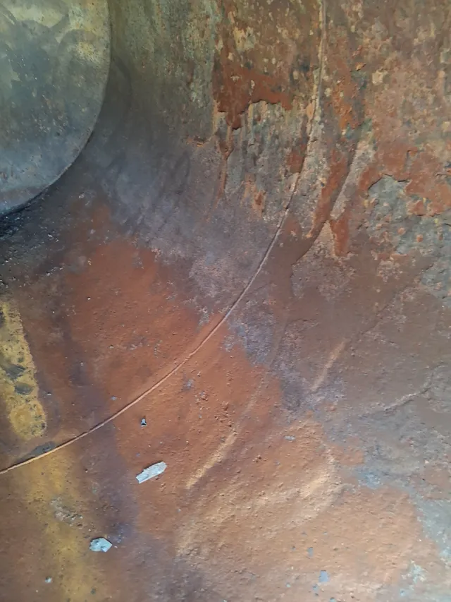 Rust and pitting on vacuum truck tank steel before blasting