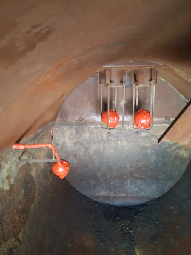 Vacuum truck tank interior fittings before surface preparation
